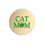 A round, brushed gold metal sticker featuring the text 'CAT MOM' in green, with the letter 'O' replaced by a green paw print icon, shown on a plain white background.