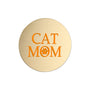 A round, brushed gold metal sticker featuring the text 'CAT MOM' in orange, with the letter 'O' stylized as a paw print, set against a plain white background.