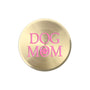 A round, brushed gold metal sticker featuring the words 'DOG MOM' in pink lettering with a paw print detail inside the letter 'O', set against a plain white background.