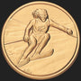 Metal Stickems 2-inch gold-toned adhesive metal sticker featuring an embossed alpine skier in motion.