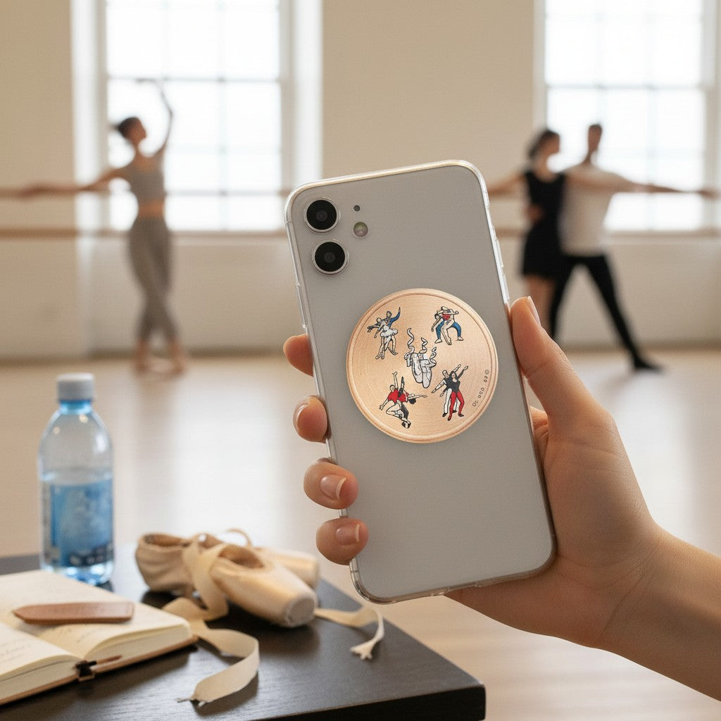 Metal Stickems ballet dancer themed round metal sticker on a smartphone case in a dance studio setting