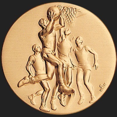 Metal Stickems 2-inch gold-toned basketball emblem featuring an embossed dynamic action scene of players on a court.