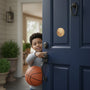 Metal Stickems 2-inch embossed basketball metal sticker applied to a navy blue front door with a young boy holding a ball
