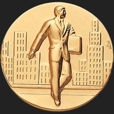 Metal Stickems 2-inch gold metallic sticker featuring an embossed businessman walking through a city skyline.
