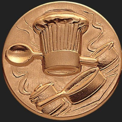 Metal Stickems 2-inch round bronze metal sticker featuring an embossed chef hat, spoon, and cooking pot design.