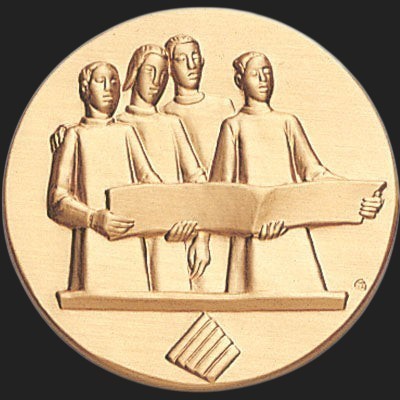 Metal Stickems 2-inch circular gold-tone metal sticker featuring a relief design of a choir group singing from a book.
