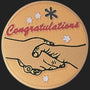 Metal Stickems 2-inch round gold-toned adhesive sticker featuring a handshake graphic and Congratulations text.