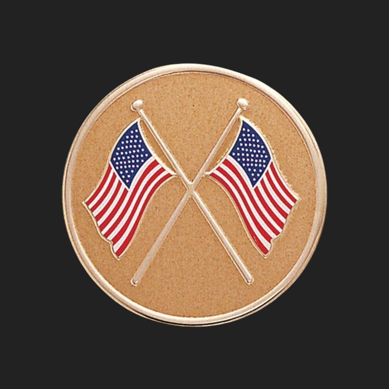Metal Stickems circular adhesive emblem featuring crossed American flags on a gold-tone metal background.