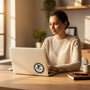 Woman working on a laptop featuring a 4-inch Metal Stickems Department of Justice metal seal sticker.