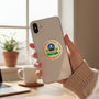 Metal Stickems 2-inch circular EPA metal sticker with official seal on a smartphone held in a hand.