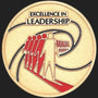 Metal Stickems 2-inch round metallic sticker featuring Excellence In Leadership text with red and gold design.