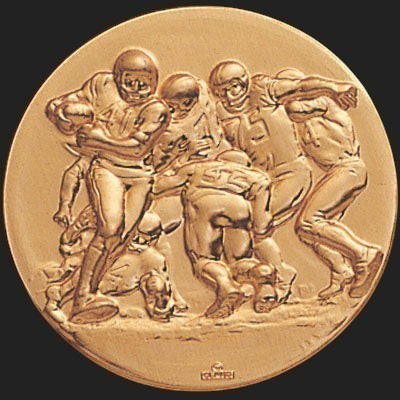 Metal Stickems 2-inch gold-toned adhesive metal decal featuring an embossed football action scene for personal gear.