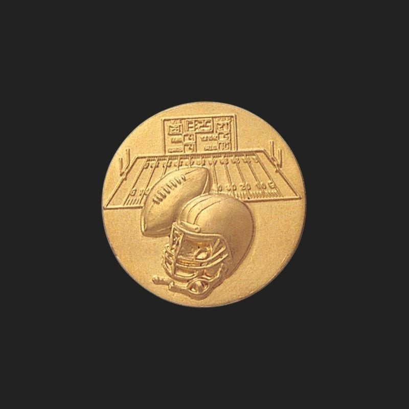 Metal Stickems 1-inch gold-tone metal sticker featuring an embossed football, helmet, and stadium field design.