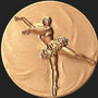 Metal Stickems 2-inch gold ballerina adhesive sticker featuring a raised relief dancer in a classic pose.