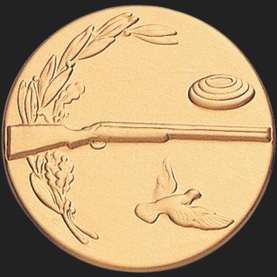 Metal Stickems 2-inch gold clay pigeon shooting emblem with embossed shotgun, clay target, and laurel wreath design.