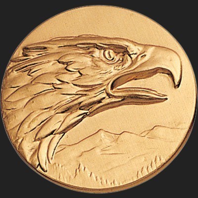 Metal Stickems 2-inch round gold metal sticker featuring a detailed eagle profile and mountain landscape design.
