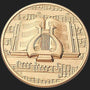 Metal Stickems gold-toned metal adhesive sticker featuring an embossed lyre and musical notation design.