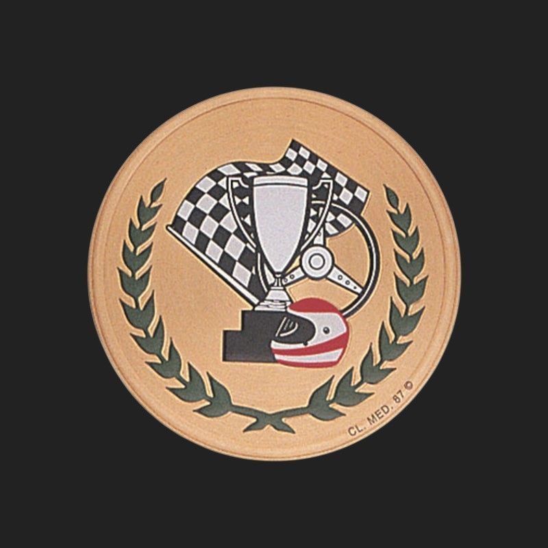 Metal Stickems 2-inch gold racing trophy emblem with checkered flag, steering wheel, helmet, and laurel wreath design.