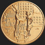 Metal Stickems 2-inch gold commemorative coin sticker featuring an embossed handshake and real estate architecture.