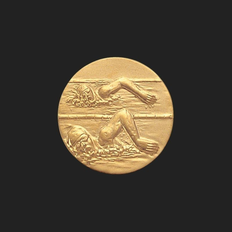 Metal Stickems 1-inch gold embossed metal sticker featuring a detailed swimmer in motion for gear and accessories.