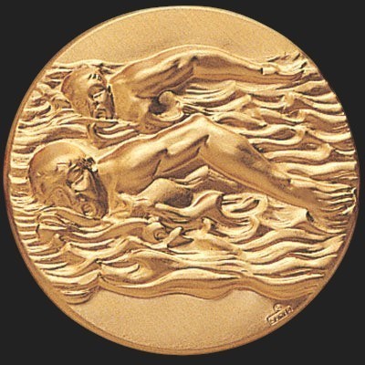 Metal Stickems 2-inch gold-tone adhesive medallion featuring an intricate relief design of swimmers in water.