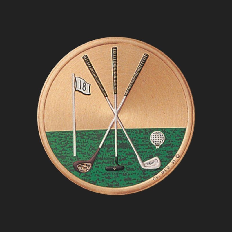 Metal Stickems 2-inch circular golf emblem featuring crossed clubs, a flag, and a golf ball on a green fairway.