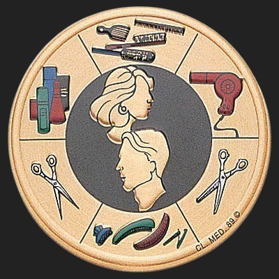 Metal Stickems 2-inch circular metal sticker featuring embossed hair salon tools and profiles of hair models.