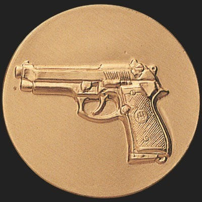 Metal Stickems 2-inch round gold-tone metal sticker featuring an embossed handgun design for tactical gear.