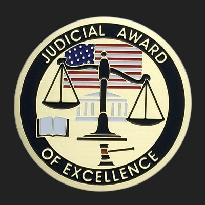 Metal Stickems 2-inch round metal sticker featuring scales of justice, courthouse, and US flag for legal professionals.