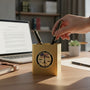 Metal Stickems 2-inch Judicial Award of Excellence sticker on a gold pen holder on a professional office desk