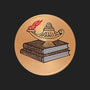 Metal Stickems 2-inch round adhesive emblem featuring a gold oil lamp on books with a red flame detail.