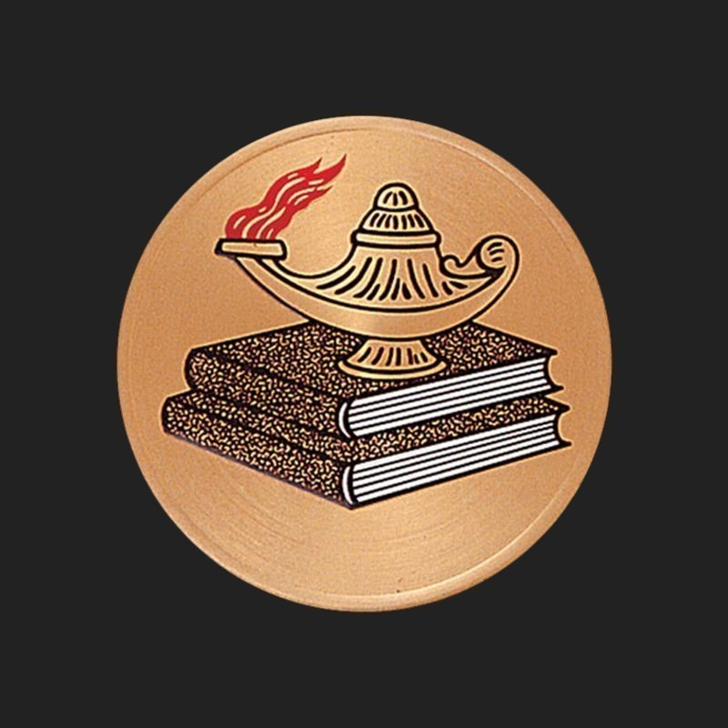 Metal Stickems 2-inch round adhesive emblem featuring a gold oil lamp on books with a red flame detail.