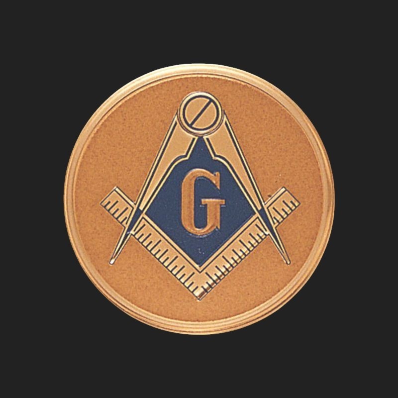 Metal Stickems 2-inch round Masonic emblem with gold square and compass and blue G symbol on a textured background