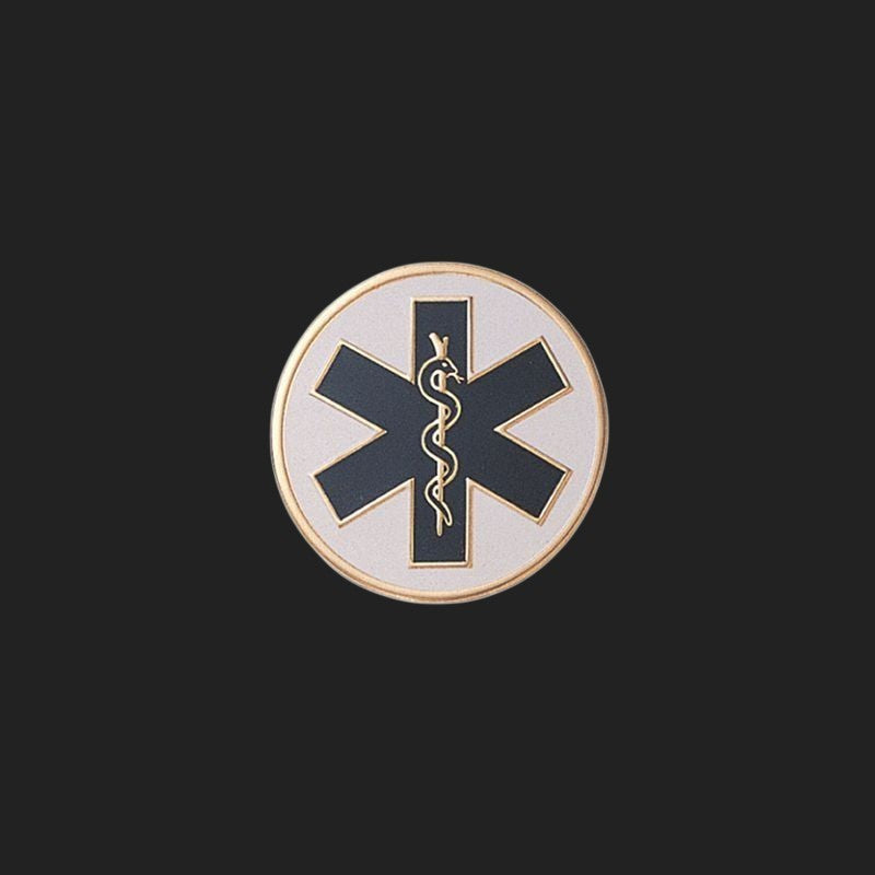 Metal Stickems 7/8 inch medical star emblem sticker in black and gold for healthcare gear and personal accessories.