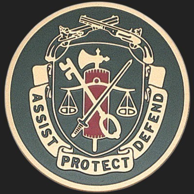 Metal Stickems 2-inch Military Police Corps emblem sticker featuring the Assist Protect Defend motto in gold and green.
