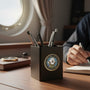 Metal Stickems Department of the Navy metal sticker featuring the official seal on a black desk pen holder