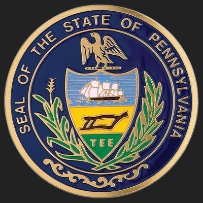 Metal Stickems 2-inch Pennsylvania State Seal metal sticker with vibrant blue, gold, and green enamel detailing.