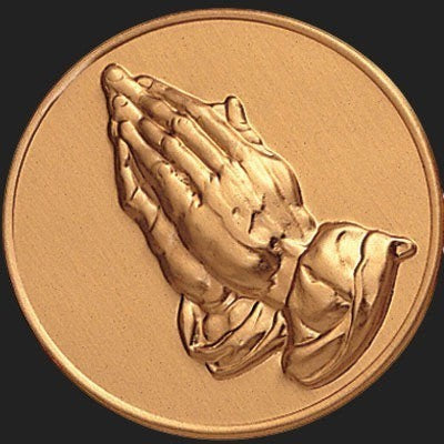 Metal Stickems 2-inch round adhesive emblem featuring a raised gold-tone praying hands relief design.