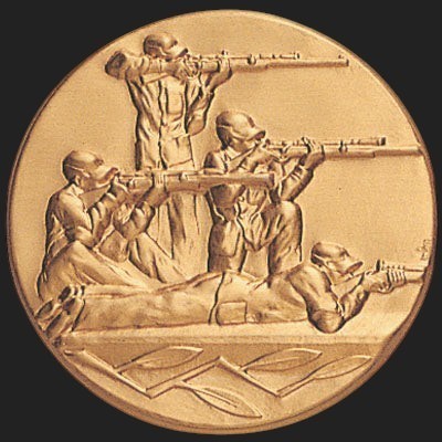 Metal Stickems 2-inch round adhesive sticker featuring an embossed design of rifle marksmen in shooting positions.