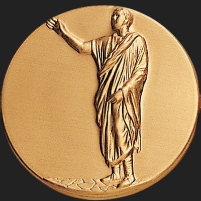 Metal Stickems 2-inch circular gold metal sticker featuring a detailed raised relief of a classic Roman figure.