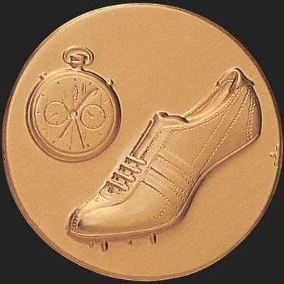 Metal Stickems 2-inch round gold metallic sticker featuring an embossed running shoe and stopwatch design.