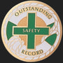 Metal Stickems 2-inch round metal sticker with a green safety cross and Outstanding Safety Record text.