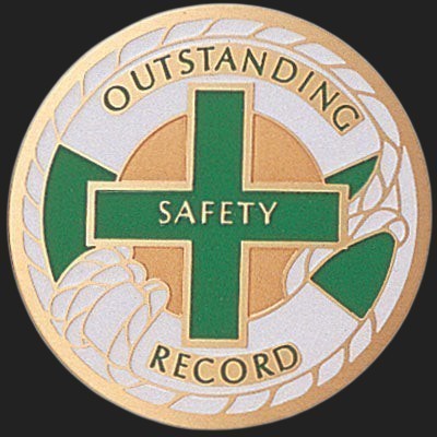 Metal Stickems 2-inch round metal sticker with a green safety cross and Outstanding Safety Record text.
