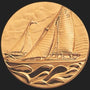 Metal Stickems 2-inch gold-toned embossed metal sticker featuring a detailed sailboat design on ocean waves.