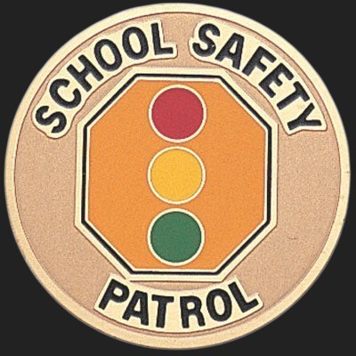 Metal Stickems 2-inch round School Safety Patrol sticker with a traffic light graphic on a metallic background.
