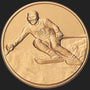 Metal Stickems 2-inch round gold-toned metal sticker featuring an embossed skiing athlete in action.