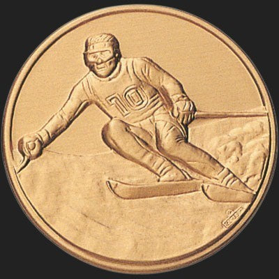 Metal Stickems 2-inch round gold-toned metal sticker featuring an embossed skiing athlete in action.
