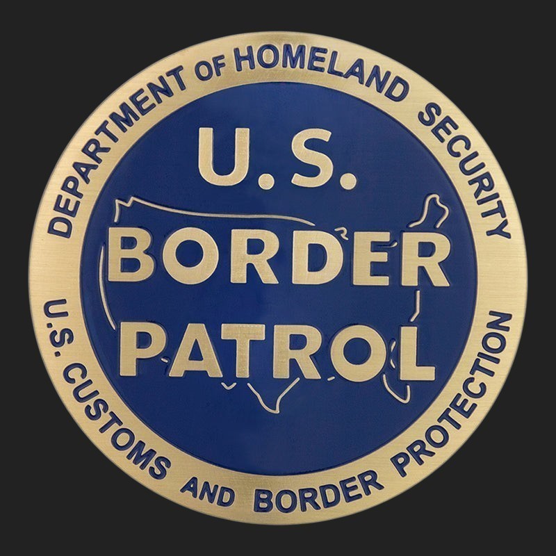 Metal Stickems 2-inch U.S. Border Patrol metal emblem in blue and gold with Department of Homeland Security text.