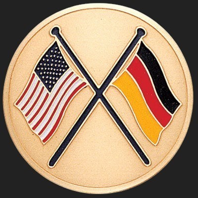 Metal Stickems 2-inch round adhesive emblem featuring crossed USA and Germany flags in a gold metallic finish.