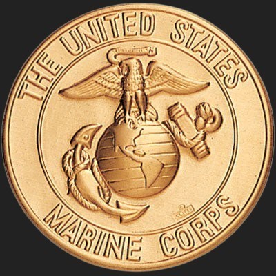 Metal Stickems 2-inch gold-tone USMC emblem featuring the Eagle, Globe, and Anchor insignia for vehicle or gear.